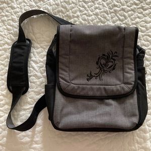 REI Cross-body bag, perfect size for a travel purse or everyday bag